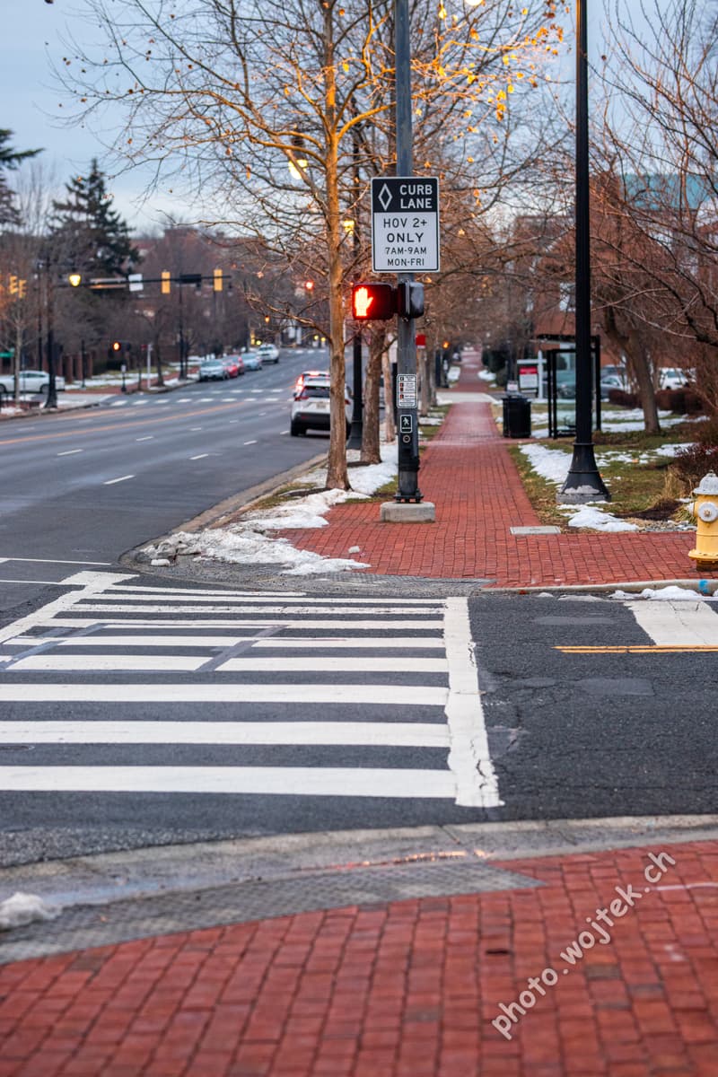 Crosswalk and curb lane sign Washington DC USA