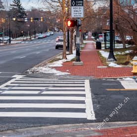 Crosswalk and curb lane sign Washington DC USA