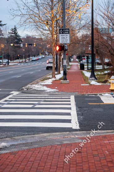 Crosswalk and curb lane sign Washington DC USA