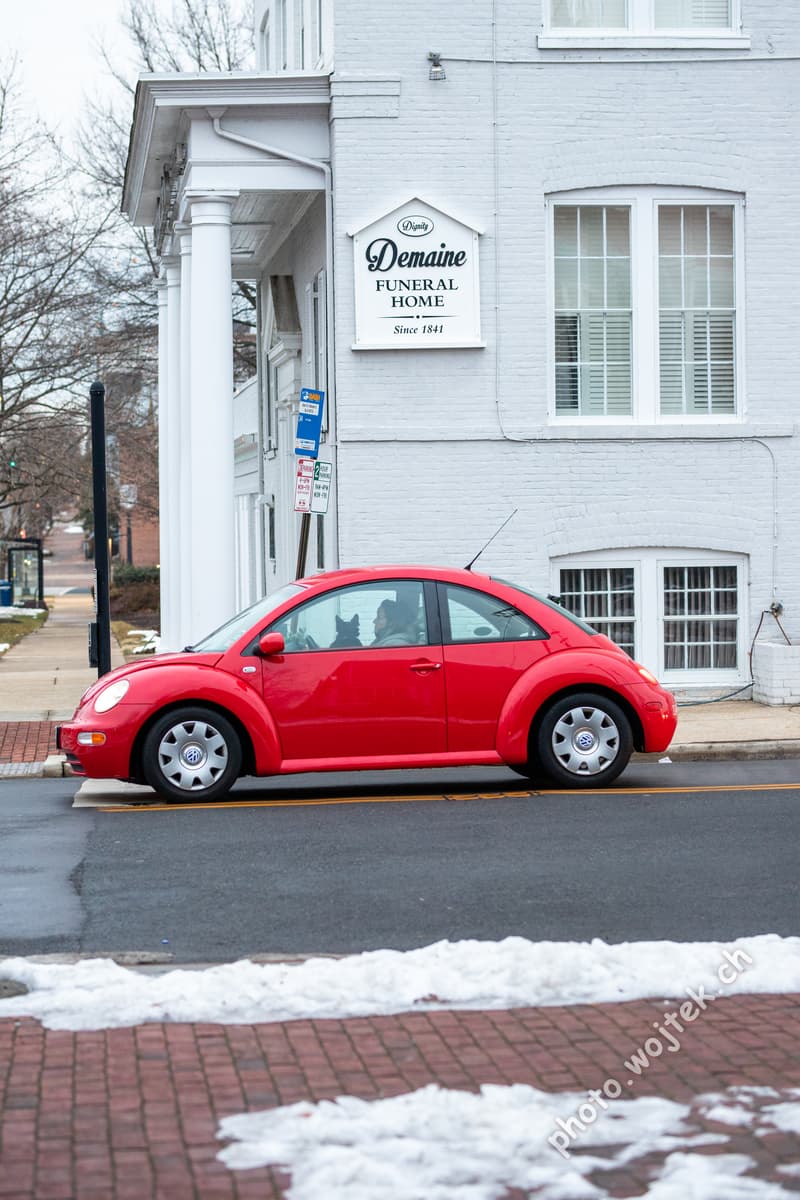 Red Volkswagen Beetle near Demaine Funeral Home Washington DC
