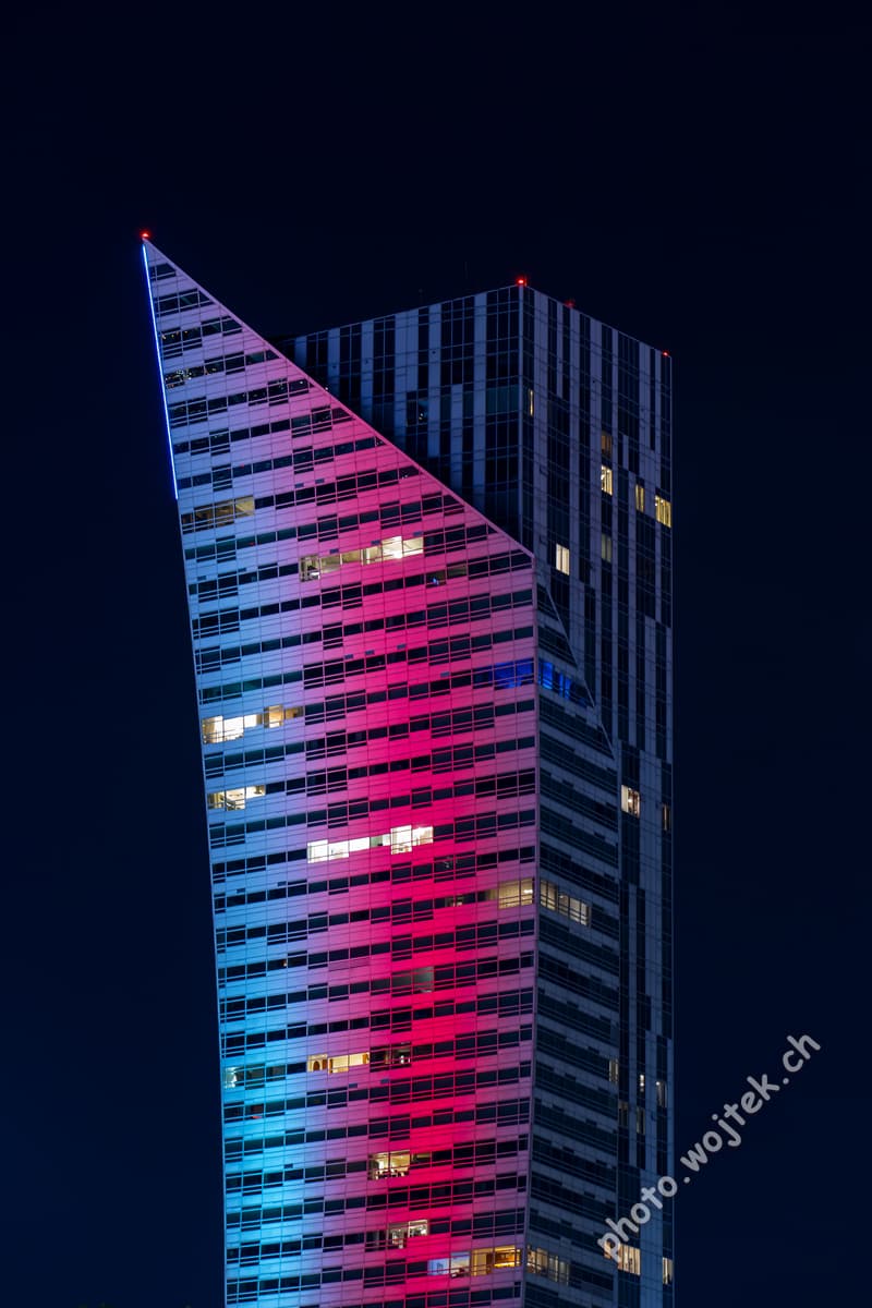 Illuminated modern skyscraper Warsaw Poland