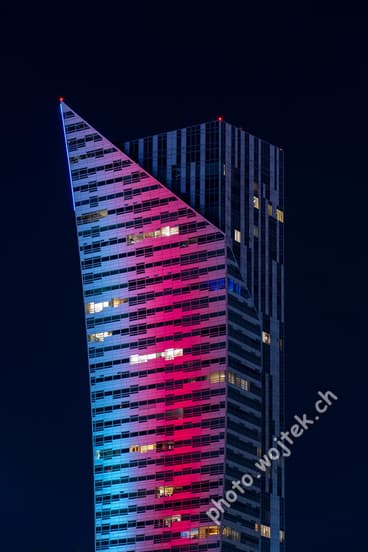 Illuminated modern skyscraper Warsaw Poland