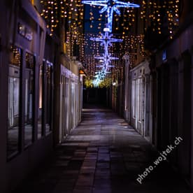 Christmas star lights on narrow street, Venice Italy