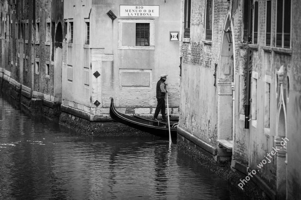 Gondolier on Canal, Venice Italy
