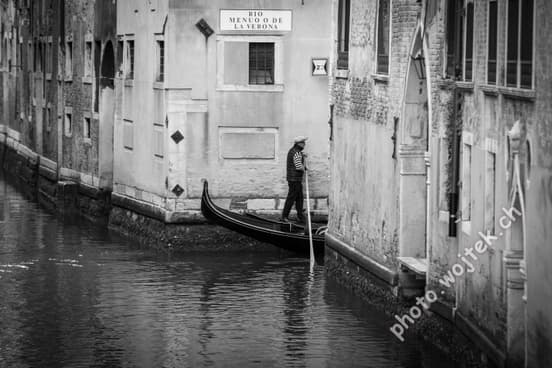 Gondolier on Canal, Venice Italy