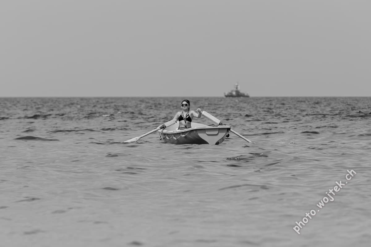 Woman rowing boat Kolobrzeg Poland