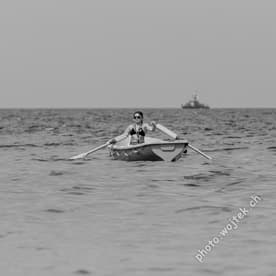 Woman rowing boat Kolobrzeg Poland