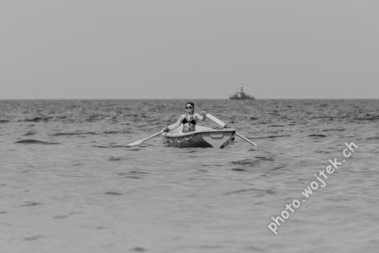 Woman rowing boat Kolobrzeg Poland