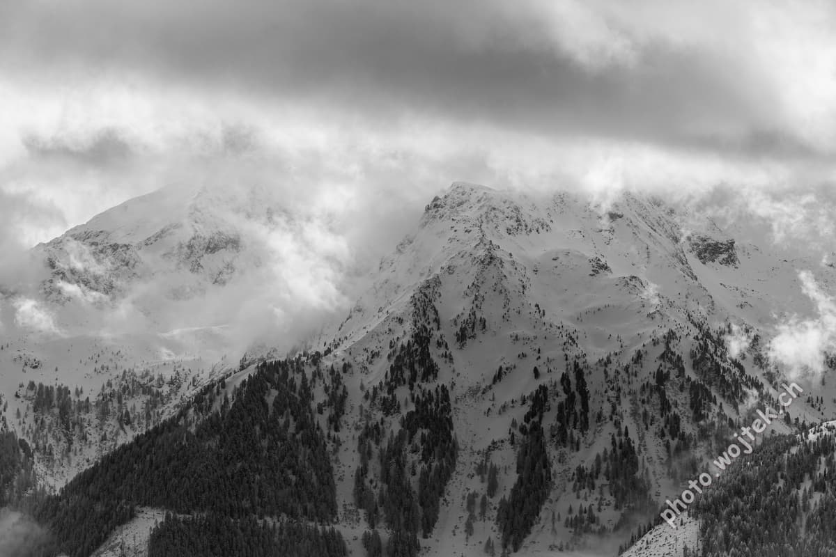 Snowy Mountains with Clouds Schladming Austria