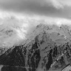 Snowy Mountains with Clouds Schladming Austria