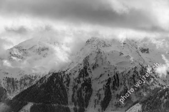 Snowy Mountains with Clouds Schladming Austria