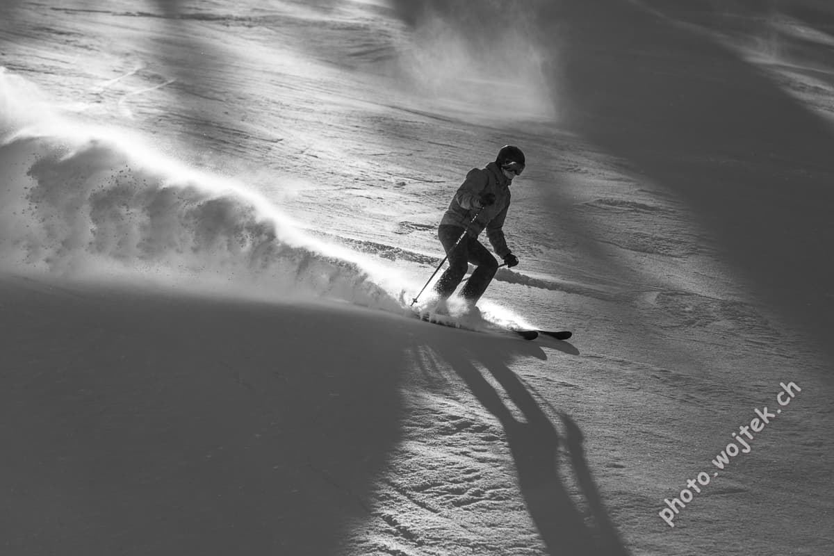 Skier carving snow slope Schladming Austria