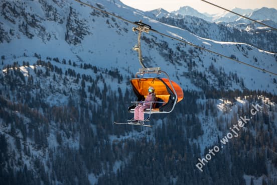 Skier on Chairlift Schladming Austria