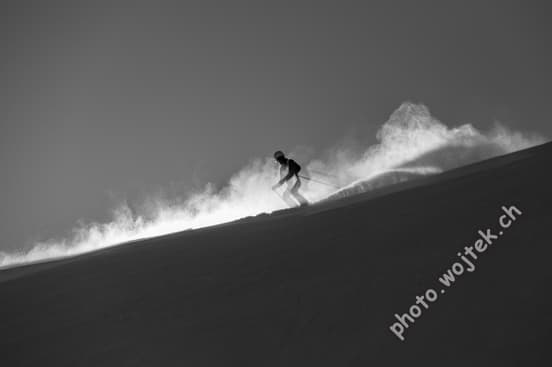 Skier on Powder Snow Slope Schladming Austria