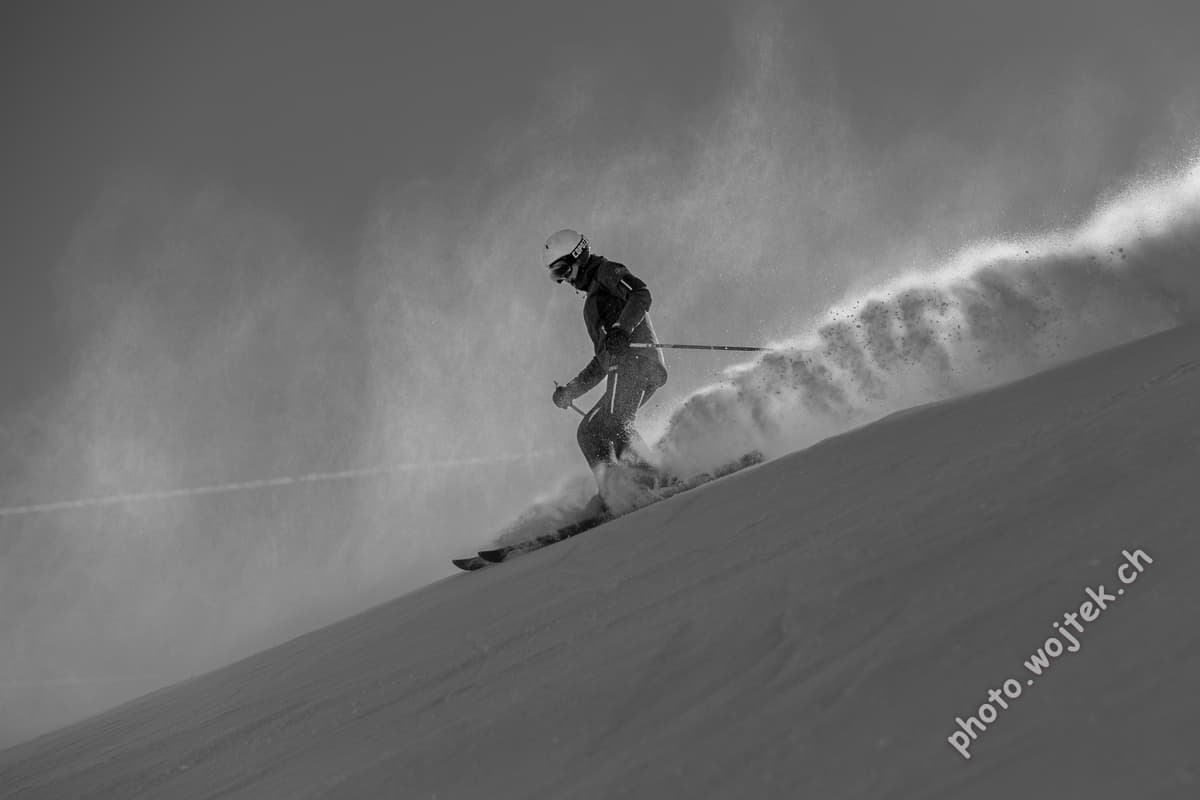 Skier carving powder snow Schladming Austria