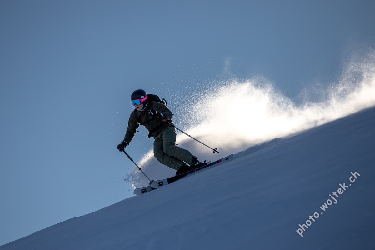 Skier carving powder snow Schladming Austria