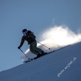 Skier carving powder snow Schladming Austria