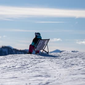 Person Relaxing on Snow Chair Schladming Austria