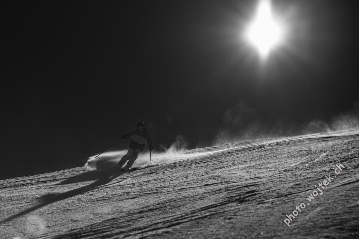 Skier carving snow slope Schladming Austria
