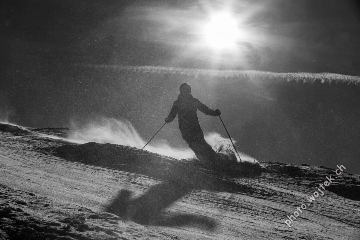 Skier silhouette on snowy slope Schladming Austria