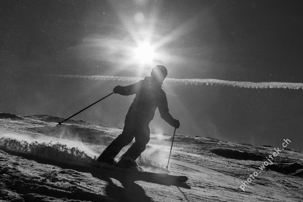 Skier silhouette on slope Schladming Austria