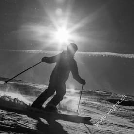 Skier silhouette on slope Schladming Austria