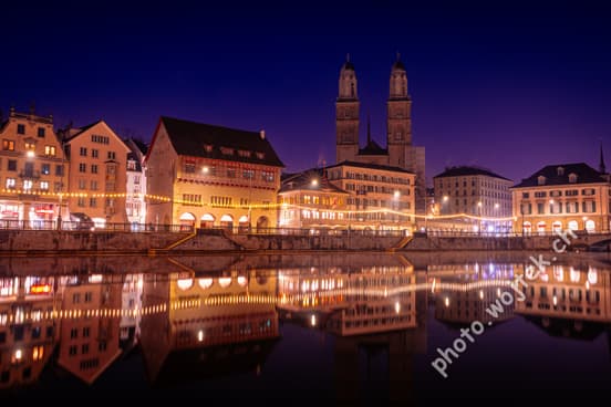 Historic buildings reflection at night Zürich Switzerland