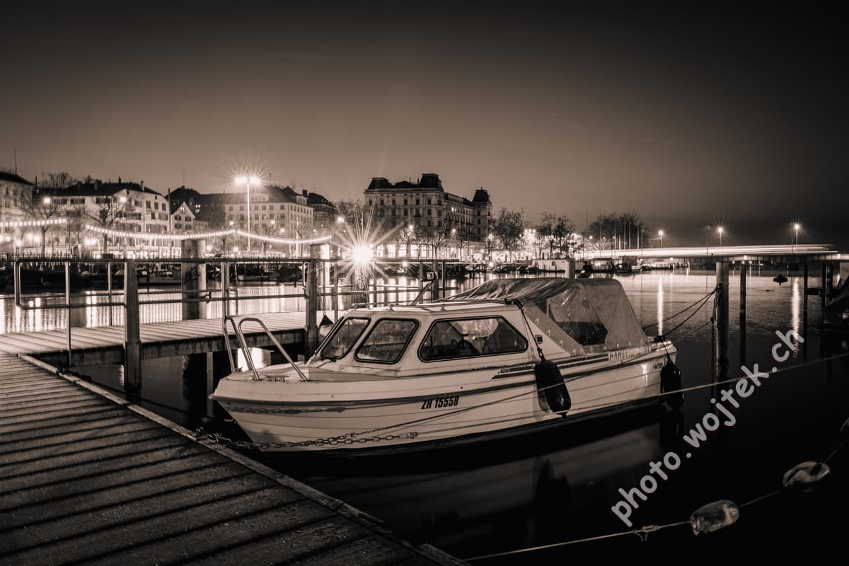 Boat docked at night Zürich Switzerland