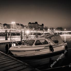 Boat docked at night Zürich Switzerland