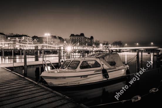 Boat docked at night Zürich Switzerland